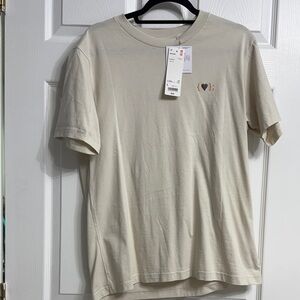 Uniqlo Men's Beige Short Sleeve Tee Peace for All